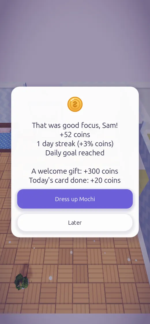 The session complete card: That was good focus, plus 52 coins, daily goal reached, and a welcome gift of 300 coins
